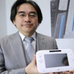 Nintendo's President Satoru Iwata displays the Wii U during E3, the Electronic Entertainment Expo, in Los Angeles